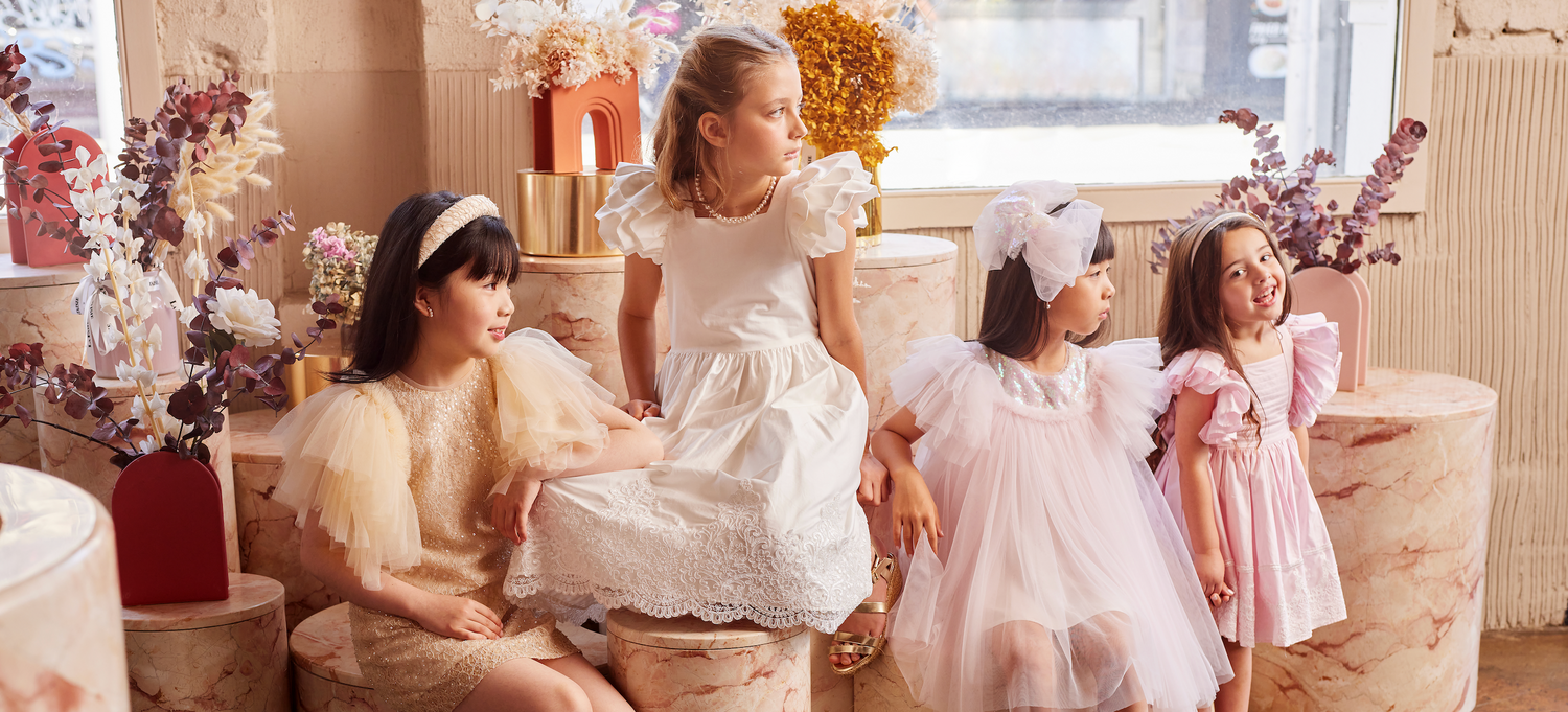 Our stunning girls dresses, featuring exquisite fabrics and meticulous craftsmanship. Perfect for party dresses and wedding flower dresses, each piece offers a gateway to a world of wonder and elegance, ensuring your little one shines at any special occasion.

